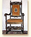 Antique English hand carved chair with cherubs
