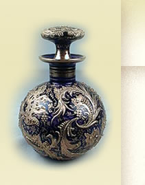 Moser cobalt bottle with gilt enamel overlay