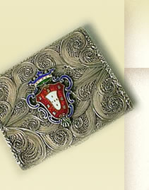 Silver filigree card case with crest