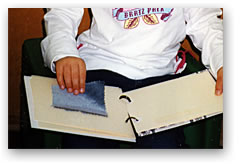 Child using Tactile  Study Aid