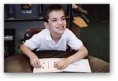Child Using Tactile Aids