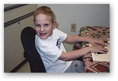 Child Using Tactile  Study Aid